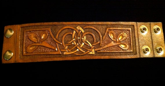 Leather wristband, Celtic- triquetra flower bracelet design with gold and copper detailing. Custom sizing available!