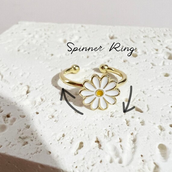 Rotating 2024 flower ring