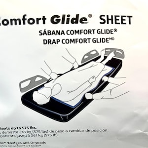 May include: White sheet labeled "Comfort Glide SHEET" with illustrations of patient positioning. The sheet is designed to assist in repositioning patients up to 575 lbs.