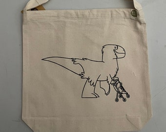 NEW ITEM FALL 2023 - Stroller Rex - Sling Bag in Natural Canvas with original art  by emily burke  - Mommy T-rex with stroller.