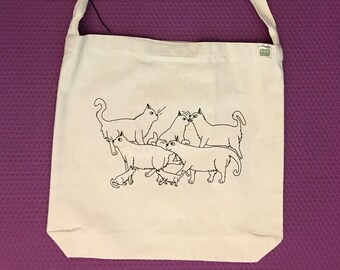 Warrior Cats - Sling Bag in Natural Canvas with original art and modeled by emily burke