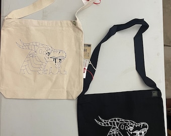 Wings of Fire Dragon - Sling Bag in Natural Canvas with original art and modeled by Emily Burke - In Natural or Black !