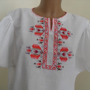 Handmade embroidered blouse with traditional Bulgarian embroidery came from the centuries