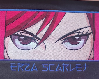 May include: Embroidered patch featuring a close-up of anime-style eyes with red hair and purple eyes. The patch is framed in pink with a blue border and the name "ERZA SCARLET" in blue lettering.