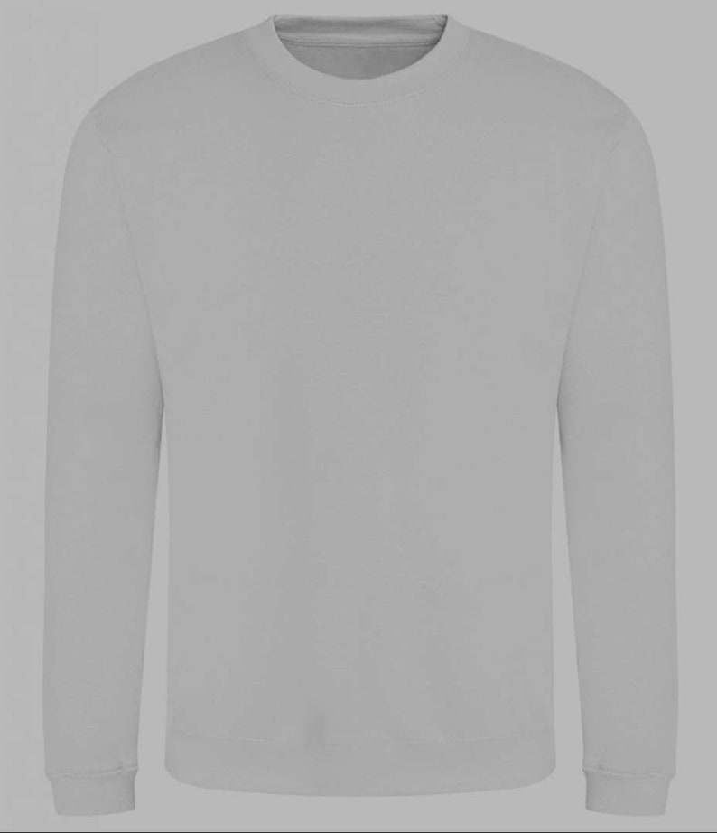 May include: A plain gray long-sleeved sweatshirt with a crew neck.