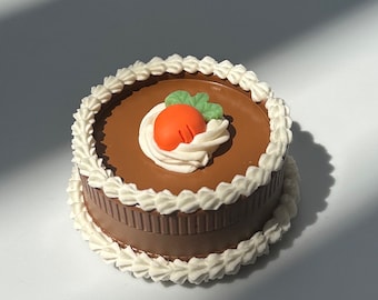 Carrot Cake Grinder - Realistic icing with carrot topper grinder