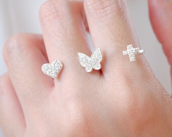 Sterlingsilver CZ-ring med flera fingrar, kors, fjäril, hjärta, kändisring