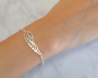 Bransoletka ze skrzydłami anioła ze srebra próby 925: minimalistyczna biżuteria pamiątkowa
