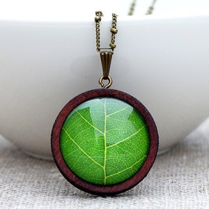 Long necklace made of wood & leaf image 1