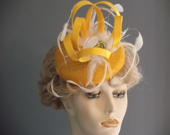 Yellow sinamay fascinator, yellow and white feather fascinator, golden yellow fascinator with yellow green stones on brooch, cocktail hat