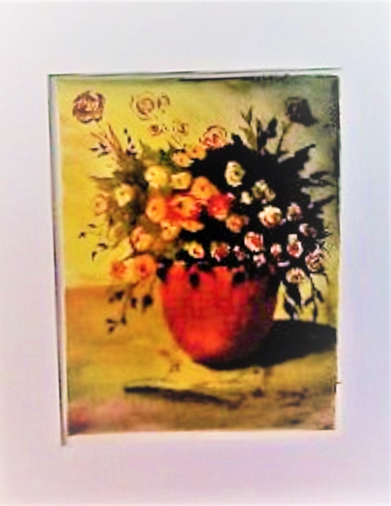 May include: A painting of a bouquet of pink, white, and yellow flowers in a red vase. The flowers are arranged in a loose, natural style, and the vase is sitting on a table with a yellow tablecloth.