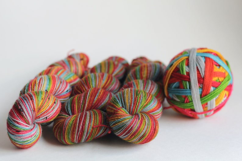 Ready to Ship Skein: Head in the Clouds 7 color self-striping Pale Silver, Blue, Grass Green, Yellow, Orange, Red & Dark Pink image 3