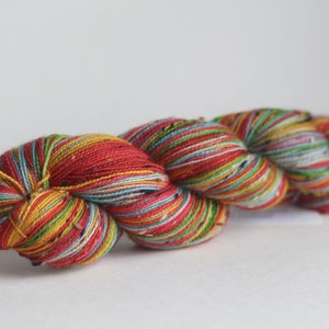 Ready to Ship Skein: Head in the Clouds 7 color self-striping Pale Silver, Blue, Grass Green, Yellow, Orange, Red & Dark Pink image 4