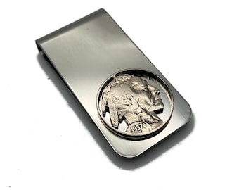 May include: Silver money clip with a 1937 Indian Head nickel coin embedded in the center.