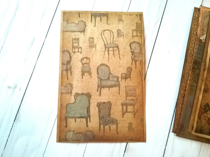 May include: A vintage-style paper with a repeating pattern of various chairs and couches in brown and black ink on a beige background.
