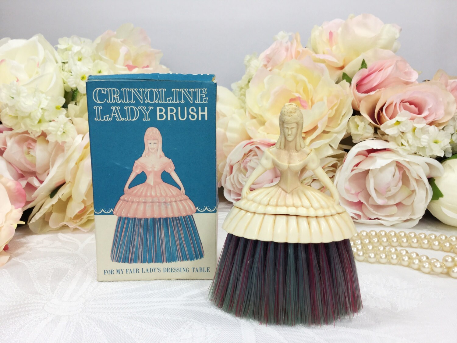 Pale Pink 1950s Crinoline Lady Brush With Pink and Blue Bristles, Table