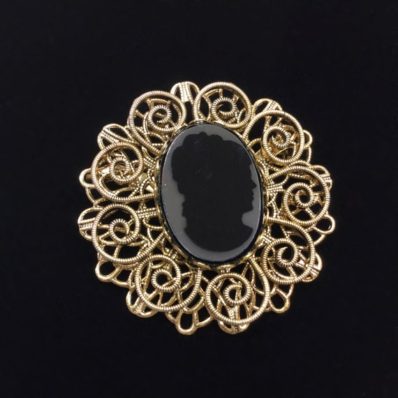 Silhouette brooch on sale