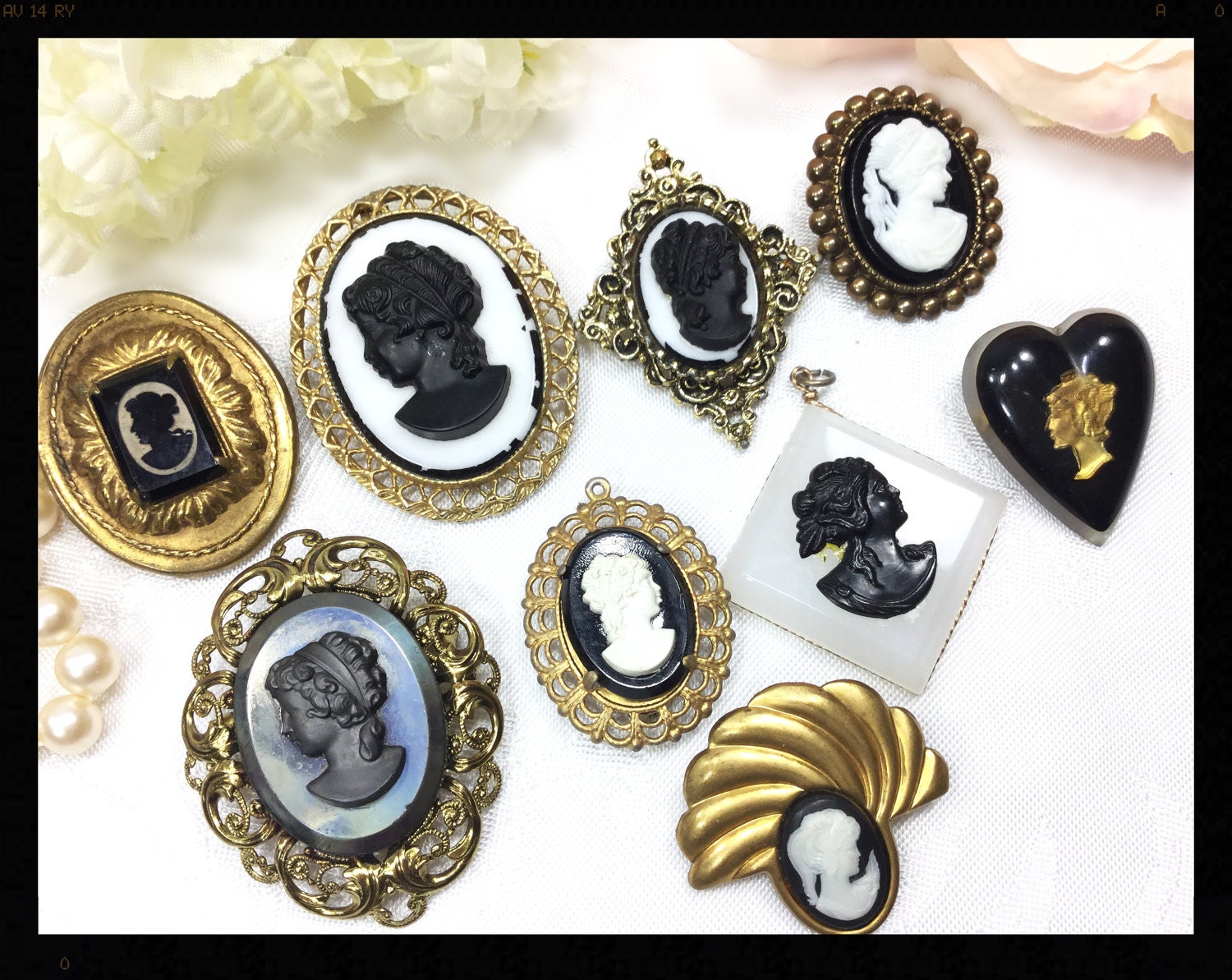 Antique black store cameo brooch