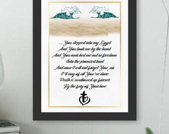 May include: Framed art print in a black frame with gold trim. The artwork displays a poem with teal wave illustrations and a cross within a heart symbol. The text is in a script font.