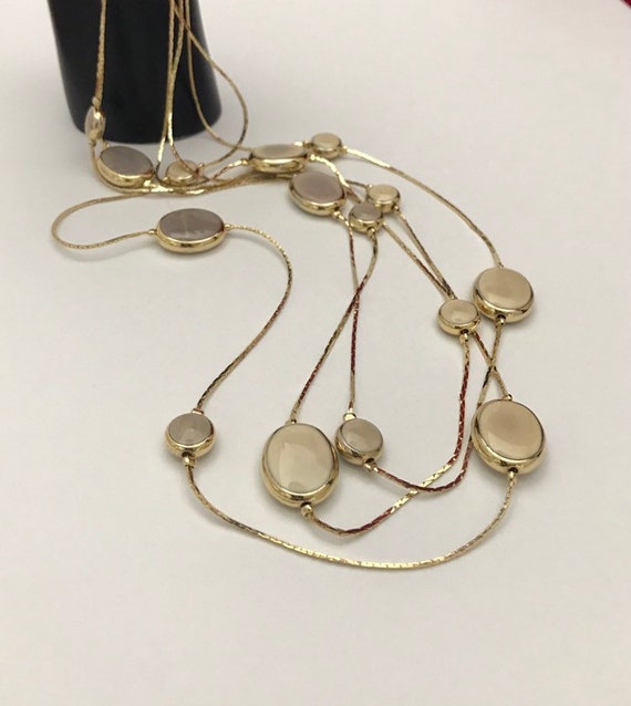 Three string necklace sale