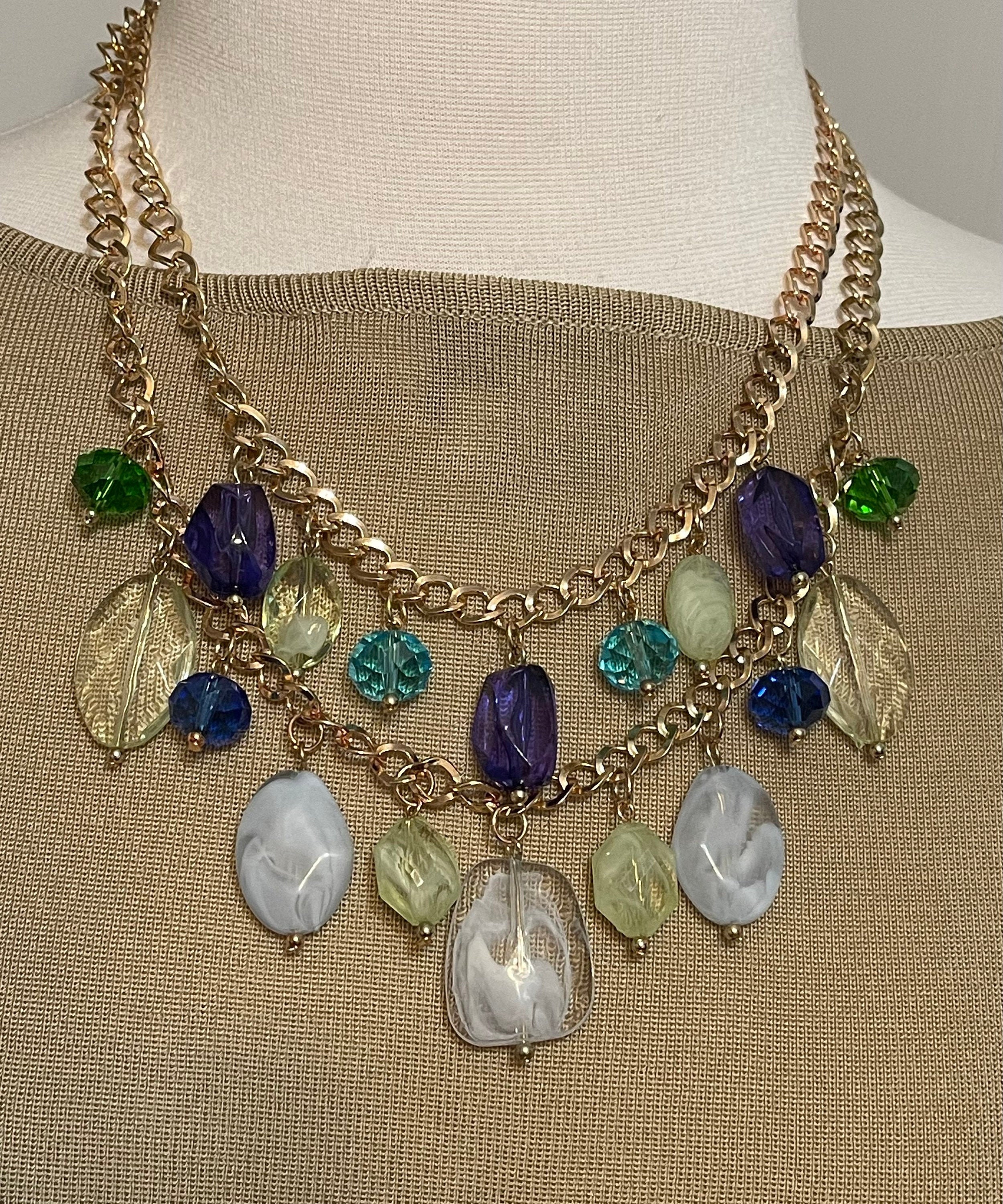 Erica Lyons 2 Strand Statement Charm Necklace. Gold Tone