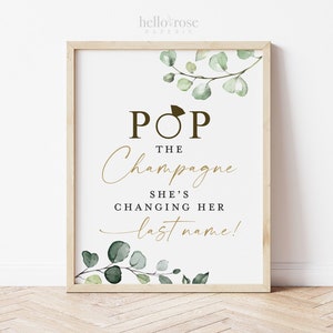 Puede incluir: Un cartel imprimible con un diseño de hojas verdes y el texto "Pop the Champagne She's Changing Her Last Name!"