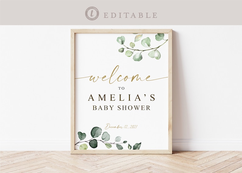 Puede incluir: Un cartel de bienvenida imprimible para un baby shower con un dise&ntilde;o de eucalipto acuarela verde. El cartel dice "Bienvenido a la fiesta de bienvenida de Amelia, 12 de diciembre de 2021".