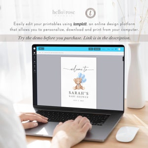 May include: A laptop displays a baby shower sign with a teddy bear and blue balloons. The sign reads "Welcome to Sarah's Baby Shower, July 2, 2025." The text "hello rose PAPERIE" is at the top. The screen also displays text about editing printables.