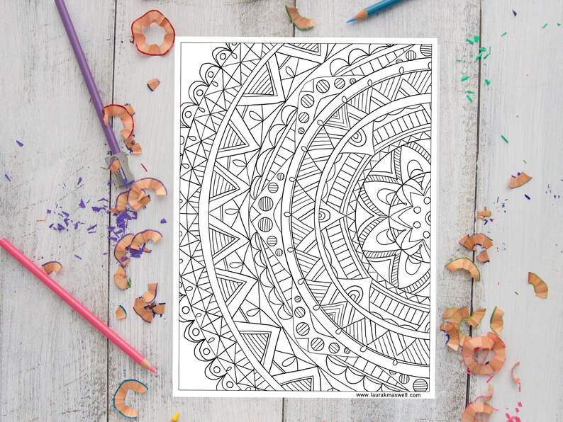 May include: A black and white mandala coloring page with intricate patterns and designs. The mandala is a half circle with a flower in the center.