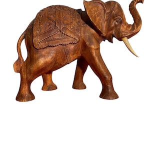 Exquisite Hand-Carved Wooden Elephant Sculpture with Elaborate Costuming and Natural Finish