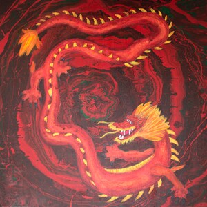 May include: A red dragon with yellow scales and claws is painted on a red, black, and green marbled background.