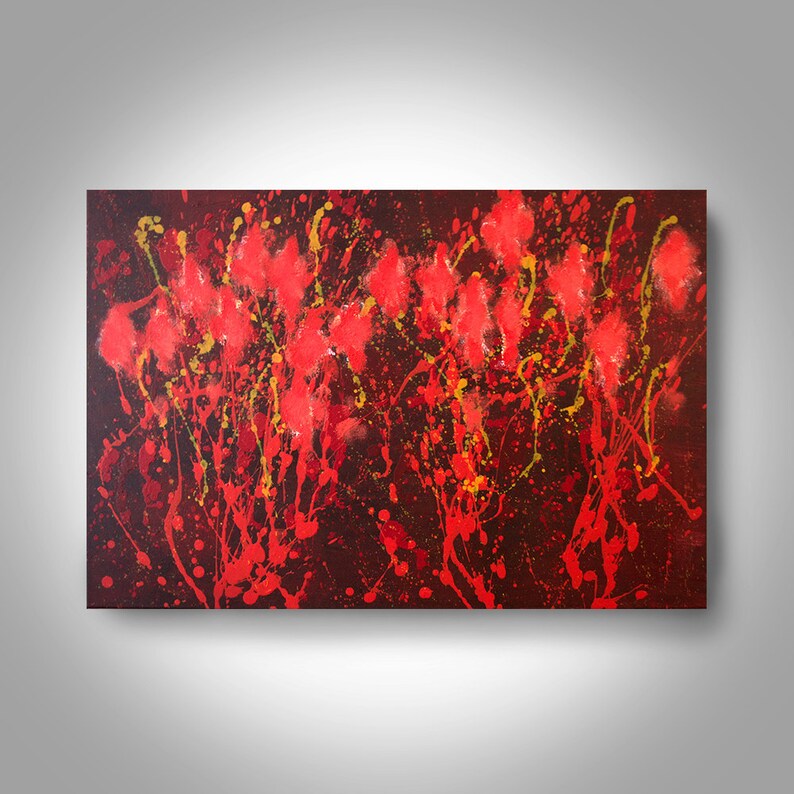 May include: Abstract painting with red, yellow, and black paint splatters on a dark background. The painting has a dynamic and energetic feel.