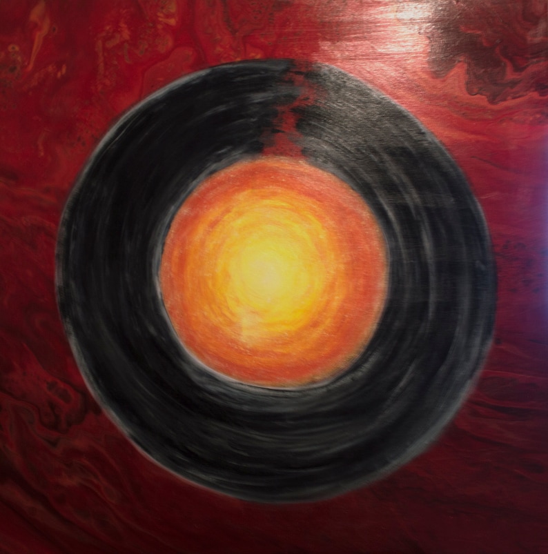 May include: Abstract painting with a black ring around a bright orange and yellow circle on a red background.