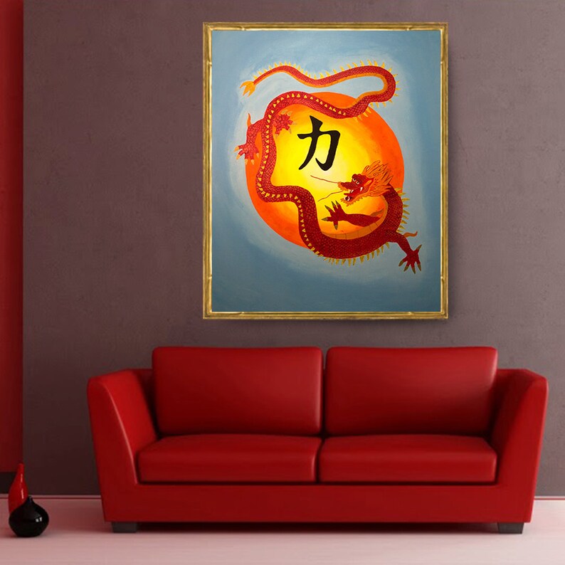 May include: A red dragon with gold accents is curled around a yellow sun with the Chinese character for "strength" in black. The painting is framed in gold.