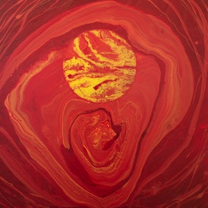 May include: Abstract painting with swirling red and yellow paint. The center of the painting features a large, round, yellow shape with red and yellow swirls.