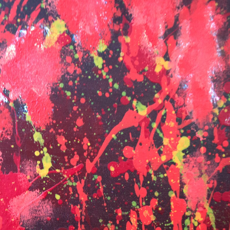 May include: Abstract painting with red, yellow, and green paint splatters on a black background.