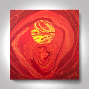 May include: Abstract painting with swirling red and yellow paint. The center of the painting features a large, round, yellow circle with red and yellow swirls.