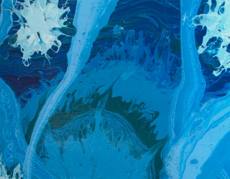 May include: Abstract painting with swirling blue, teal, and white paint. The colors blend together to create a dynamic and energetic composition.