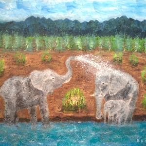 May include: A painting of three elephants in a field near a river. The elephant in the foreground is spraying water from its trunk. The elephants are painted in shades of gray against a brown background with green bushes and a blue sky.