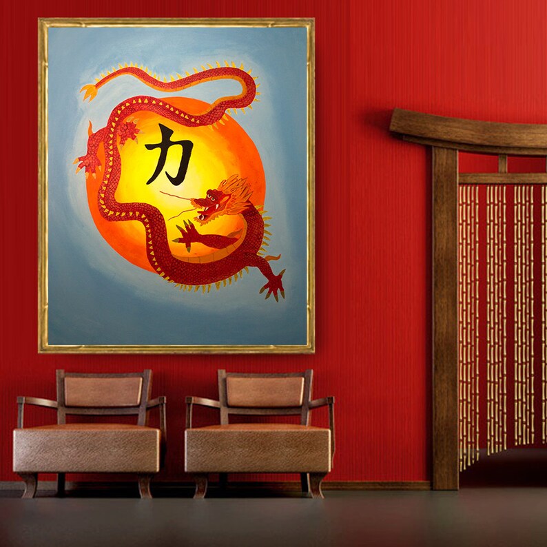 May include: A framed painting of a red dragon with gold accents, curled around a red and orange sun with the Chinese character for "strength" in black.