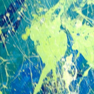 May include: Abstract painting with a vibrant mix of colors. The artwork features a deep blue background with splashes of bright green and white paint. The paint is splattered and dripped, creating a dynamic and energetic composition. The style is reminiscent of action painting.