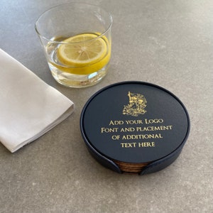 May include: Black leather coaster with a gold ship design and the text "ADD YOUR LOGO FONT AND PLACEMENT OF ADDITIONAL TEXT HERE".