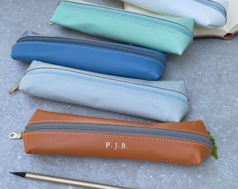 A Recycled Leather Zip Case. Your Eco-Friendly, Multifunctional Companion Available in 26 Vibrant Colours