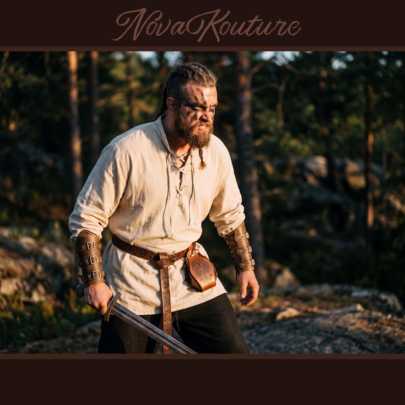 May include: A person wearing a cream-colored tunic, brown leather belt, and arm bracers, holding a sword. The outfit includes a leather pouch and is set against a forest backdrop. The text "Nova Kouture" is at the top.