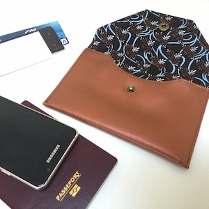 Pequeña bolsa de almacenamiento para tus papeles o teléfono, monedero, bolsa para papeles del coche.