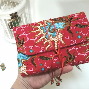 Pochette de rangement pour bijoux à plier ou rouler, un organisateur de bijoux en coton