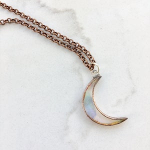 Baby Crescent Moon Necklace (clear iridescent)