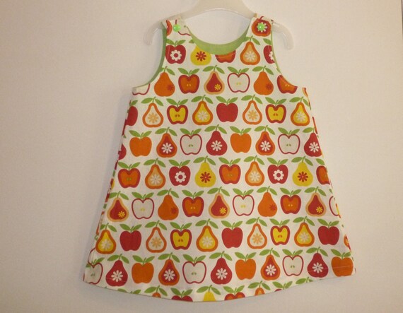 yellow dress with red apples