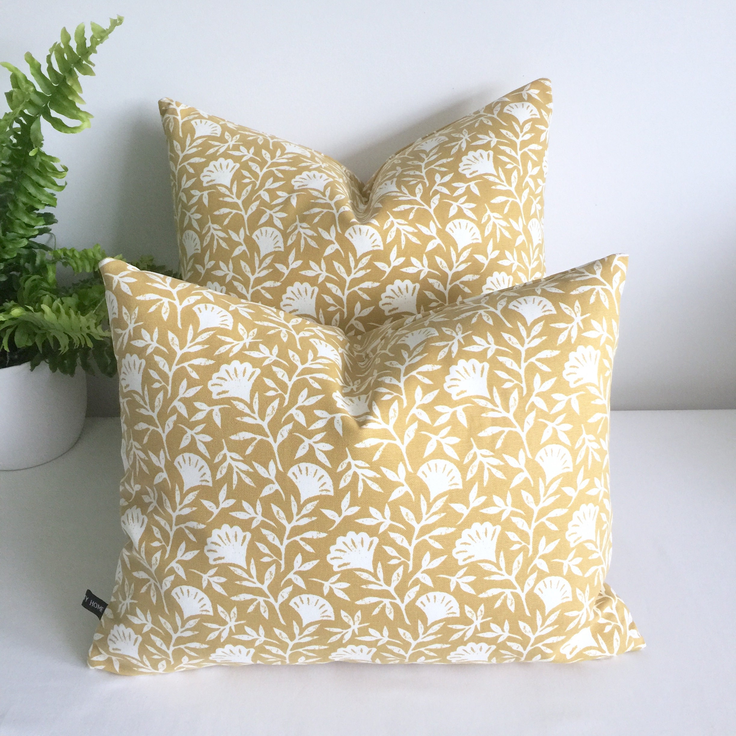 Mustard floral cushion hotsell