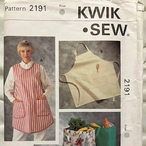 May include: A Kwik Sew pattern 2191 featuring a woman wearing a red and white striped apron with pockets. The image also shows a beige apron, floral and green shopping bags, and the text "KWIK SEW".